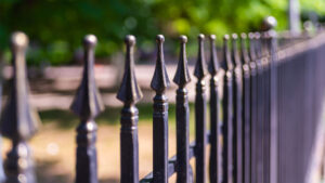 Close up image of attractive ornamental fence against blurry background