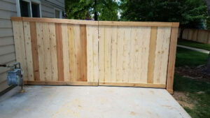 Cedar wood fence that could use staining